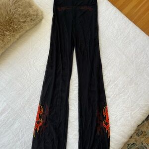 Heron Preston Mesh Sheer Pants with Flame Print